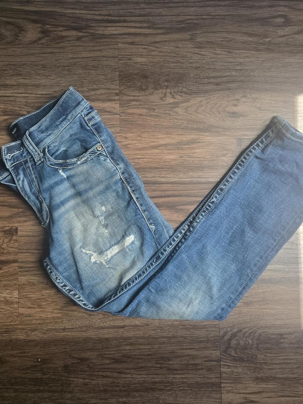 Distressed Blue Denim Jeans